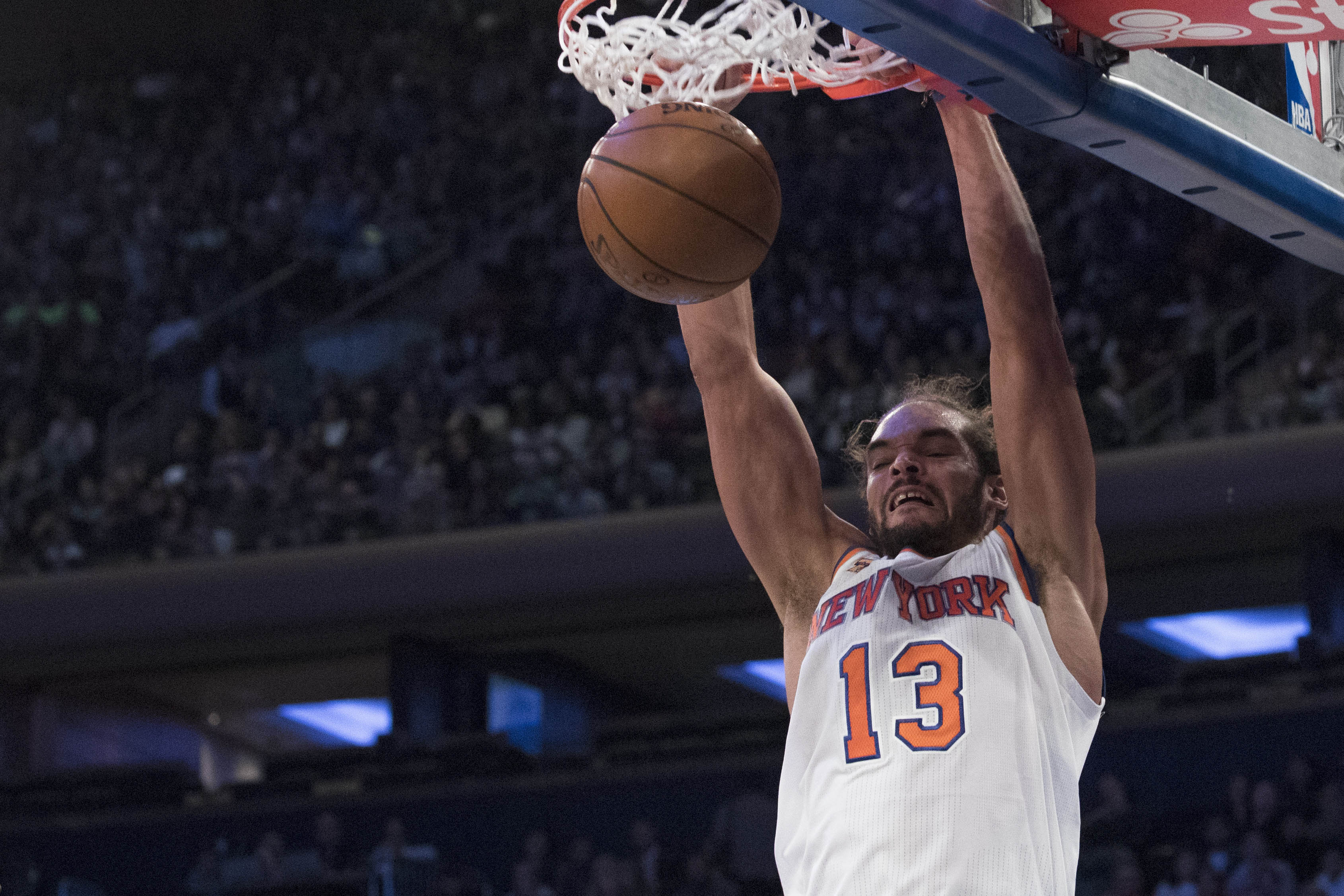 New York Knicks center Joakim Noah dunks during the first half of a preseason NBA basketball game against the Boston Celtics, Saturday, Oct. 15, 2016, at Madison Square Garden in New York. (AP Photo/Mary Altaffer)