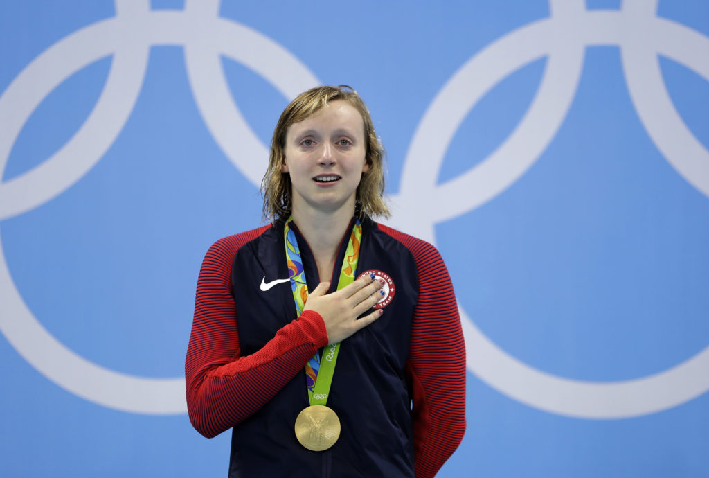 United States' Katie Ledecky, cries after winning gold, in the women's 800-meter freestyle medals ceremony during the swimming competitions at the 2016 Summer Olympics, Friday, Aug. 12, 2016, in Rio de Janeiro, Brazil. (AP Photo/Michael Sohn)
