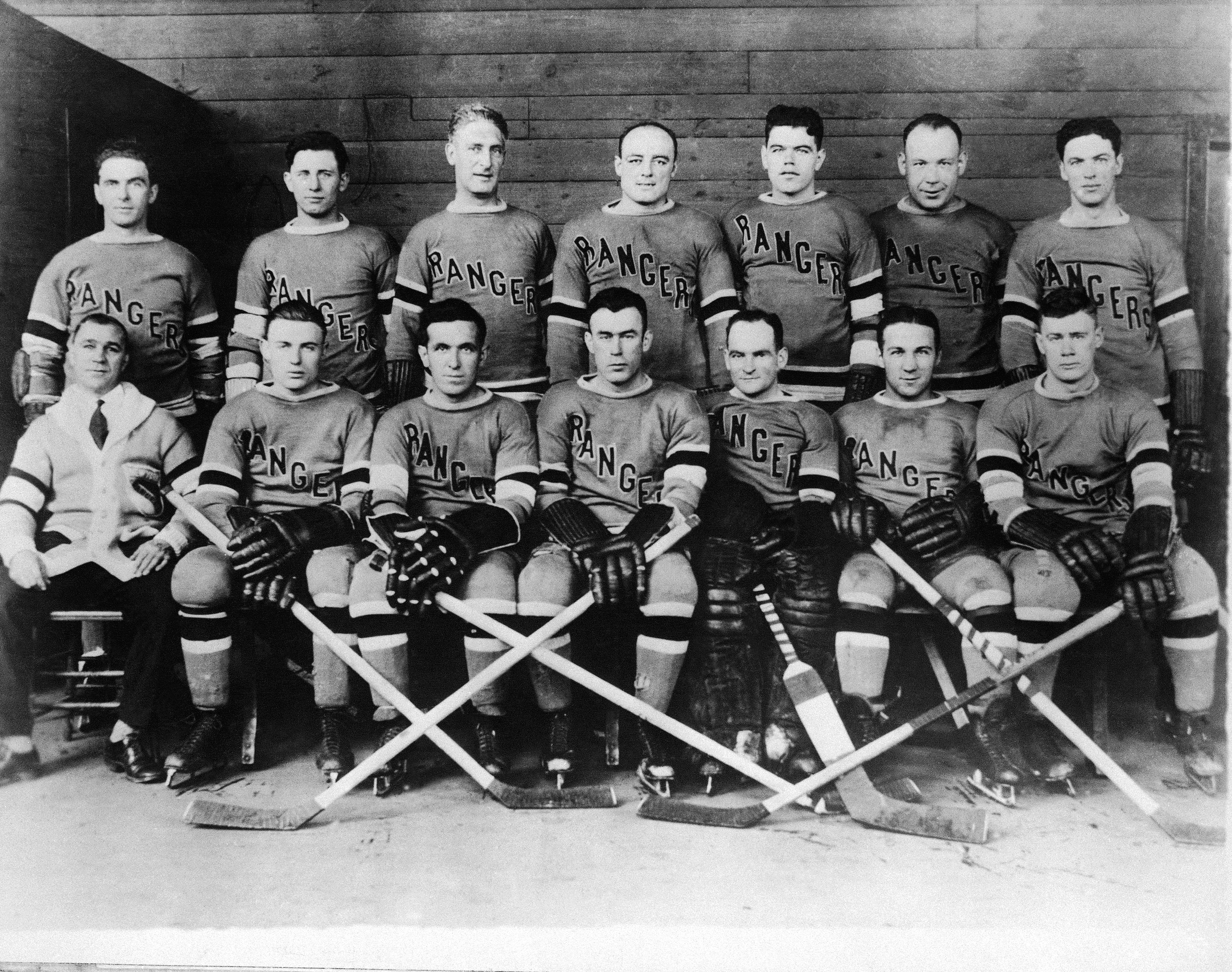 The New York Rangers, members of the National Hockey League, are working hard in preparation for the opening of the hockey season. They will make their first home appearance in New York Nov. 18, 1928. Left to right top row, Billy Boyd, Butch Keeling, manager Lester Patrick, Ching Johnson, Myles Lane, Taffy Abel, Paul Thompson. Bottom Row--Trainer Harry Westerby, Murray Murdock, Frank Boucher, Bill Cook, John Ross, Leo Bourgault, and Bunny Cook. (AP Photo)
