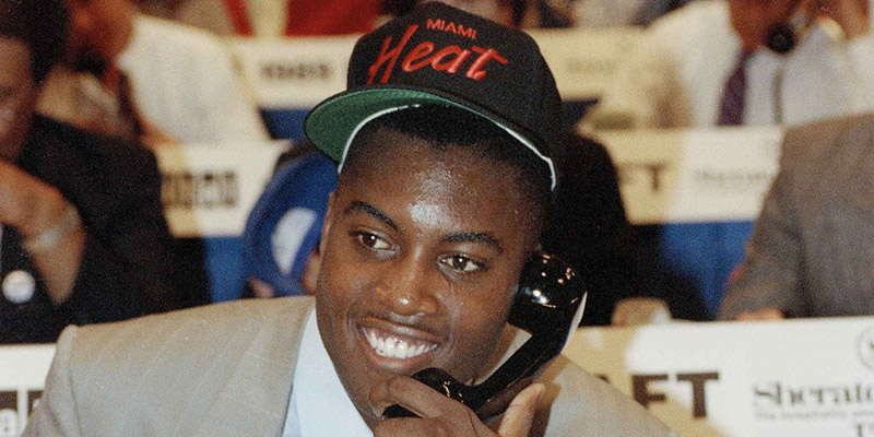 University of Michigan basketball player Glen Rice talks on the phone with the staff of the Miami Heat basketball team after they selected him as their first choice in the NBA draft in New York, June 28, 1989. (AP Photo/Ed Bailey)