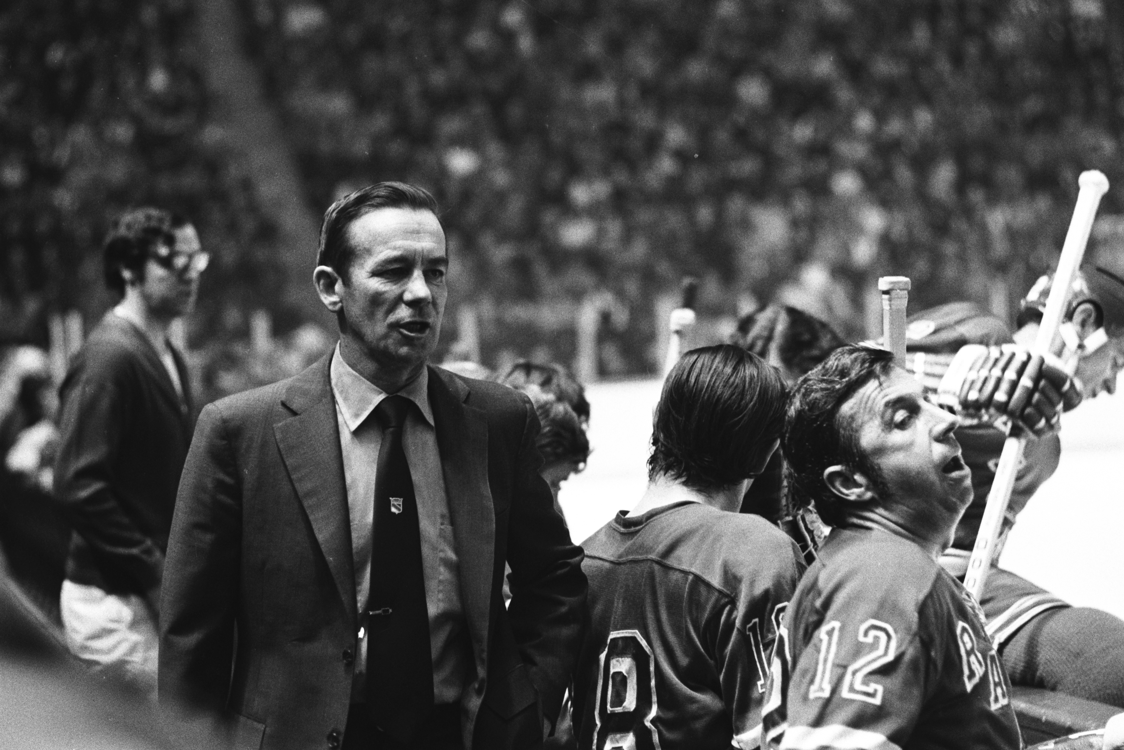 MONTREAL, CANADA- CIRCA 1972: Head Coach Emile Francis of the New York Rangers follows the action from the bench Circa 1972 at the Montreal Forum in Montreal, Quebec, Canada. (Photo by Denis Brodeur/NHLI via Getty Images)