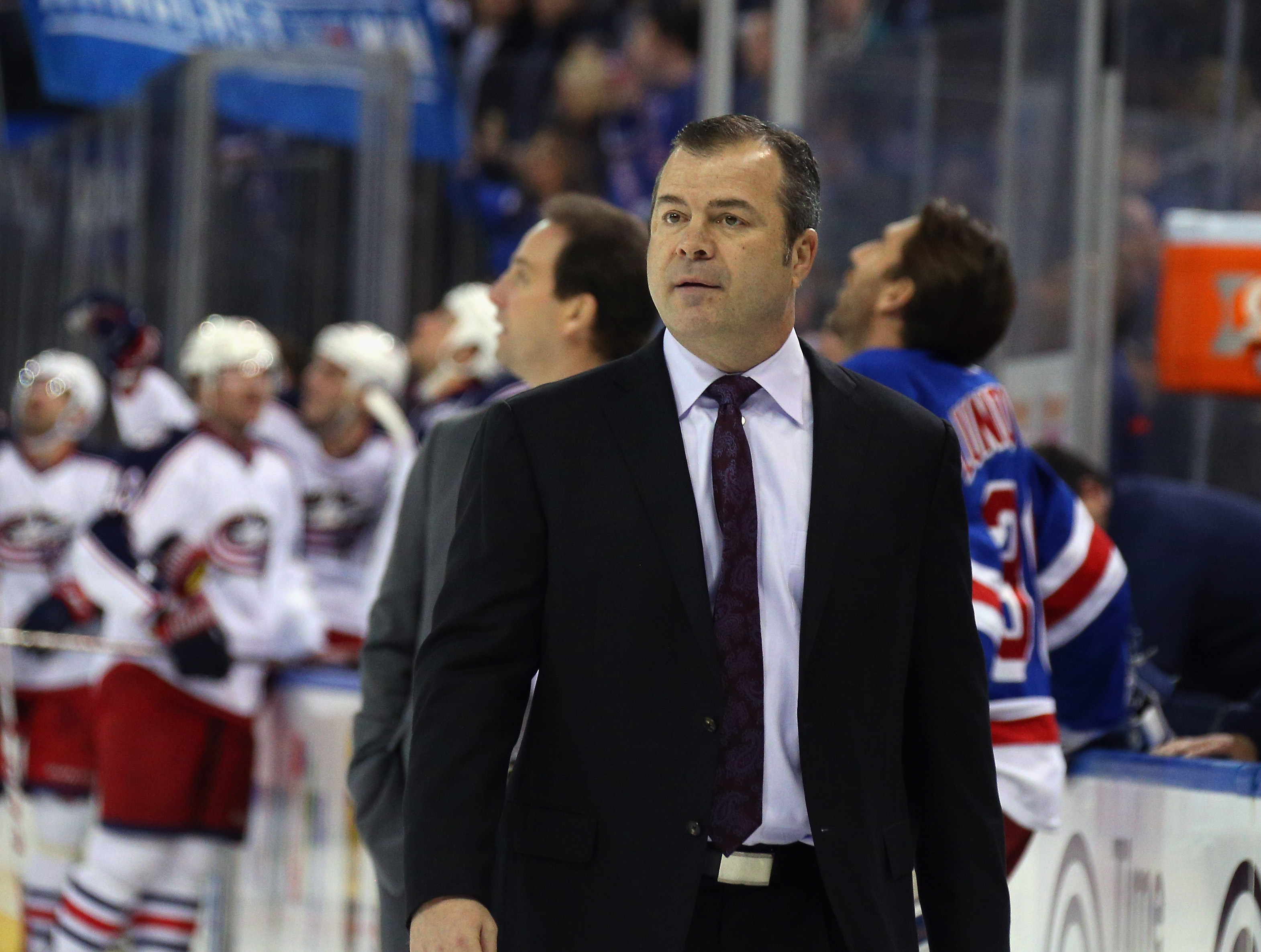 NEW YORK, NY - FEBRUARY 29: Alain Vigneault of the New York Rangers leaves the ice following a game against the Columbus Blue Jackets at Madison Square Garden on February 29, 2016 in New York City. The Rangers defeated the Blue Jackets 2-1. (Photo by Bruce Bennett/Getty Images)