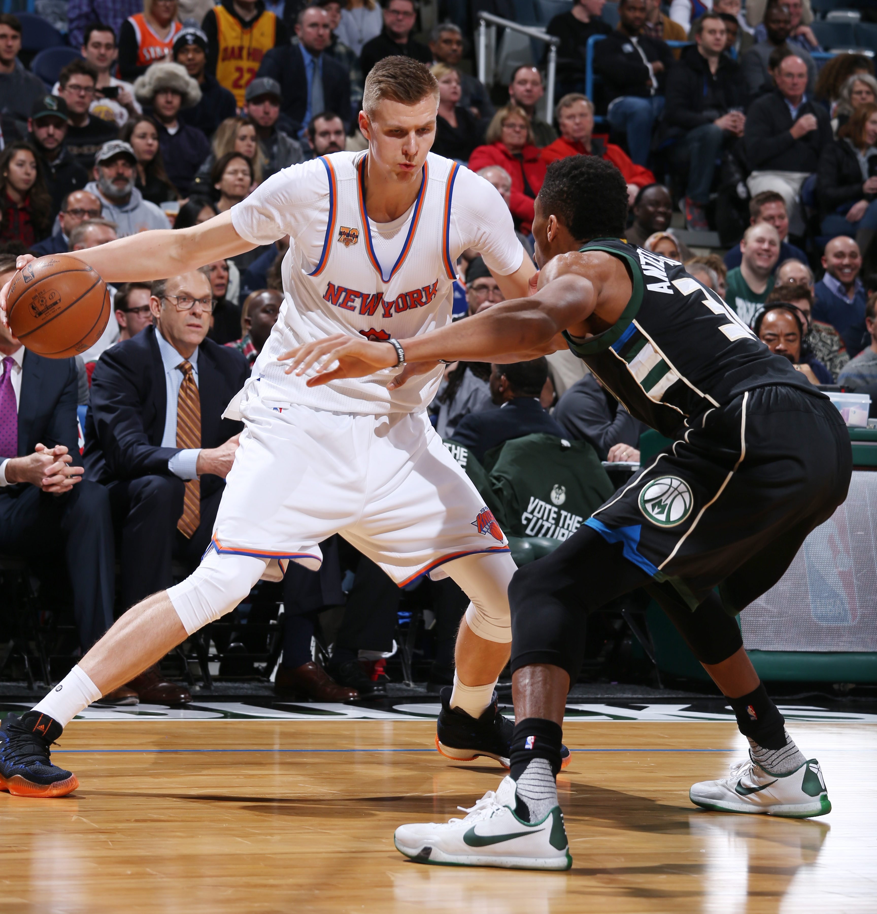Milwaukee, WI - JANUARY 6: Kristaps Porzingis #6 of the New York Knicks handles the ball against the Milwaukee Bucks during the game on January 6, 2017 at the BMO Harris Bradley Center in Milwaukee, Wisconsin. NOTE TO USER: User expressly acknowledges and agrees that, by downloading and or using this Photograph, user is consenting to the terms and conditions of the Getty Images License Agreement. Mandatory Copyright Notice: Copyright 2017 NBAE (Photo by Gary Dineen/NBAE via Getty Images)