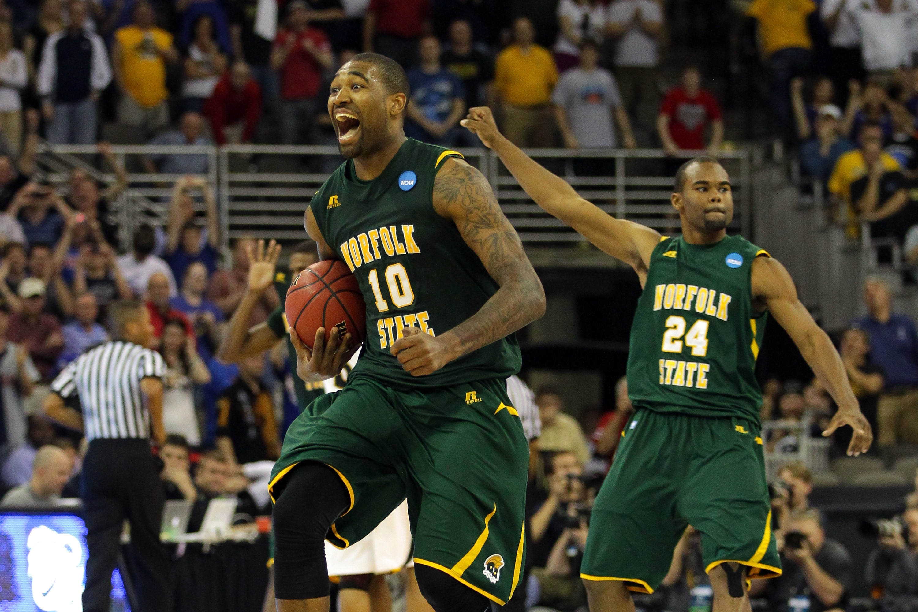 OMAHA, NE - MARCH 16: Kyle O'Quinn #10 and Brandon Wheeless #24 of the Norfolk State Spartans celebrate after they won 86-84 against the Missouri Tigers during the second round of the 2012 NCAA Men's Basketball Tournament at CenturyLink Center on March 16, 2012 in Omaha, Nebraska. (Photo by Doug Pensinger/Getty Images)