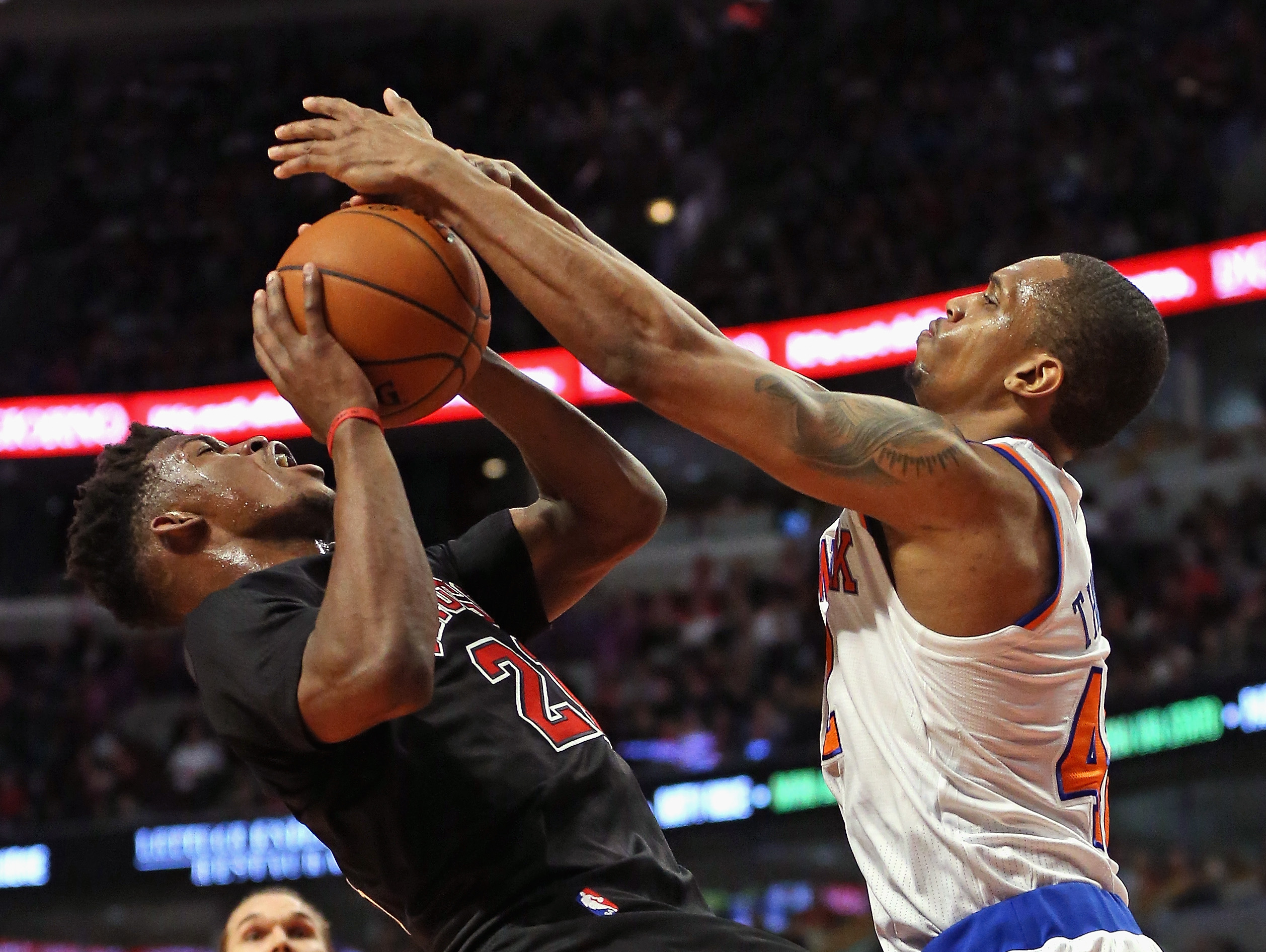 CHICAGO, IL - MARCH 28: Lance Thomas #42 of the New York Knicks stops Jimmy Butler #21 of the Chicago Bulls from getting off a shot at the United Center on March 28, 2015 in Chicago, Illinois. The Bulls defeated the Knicks 111-80. NOTE TO USER: User expressly acknowledges and agrees that, by downloading and or using this photograph, User is consenting to the terms and conditions of the Getty Images License Agreement. (Photo by Jonathan Daniel/Getty Images)
