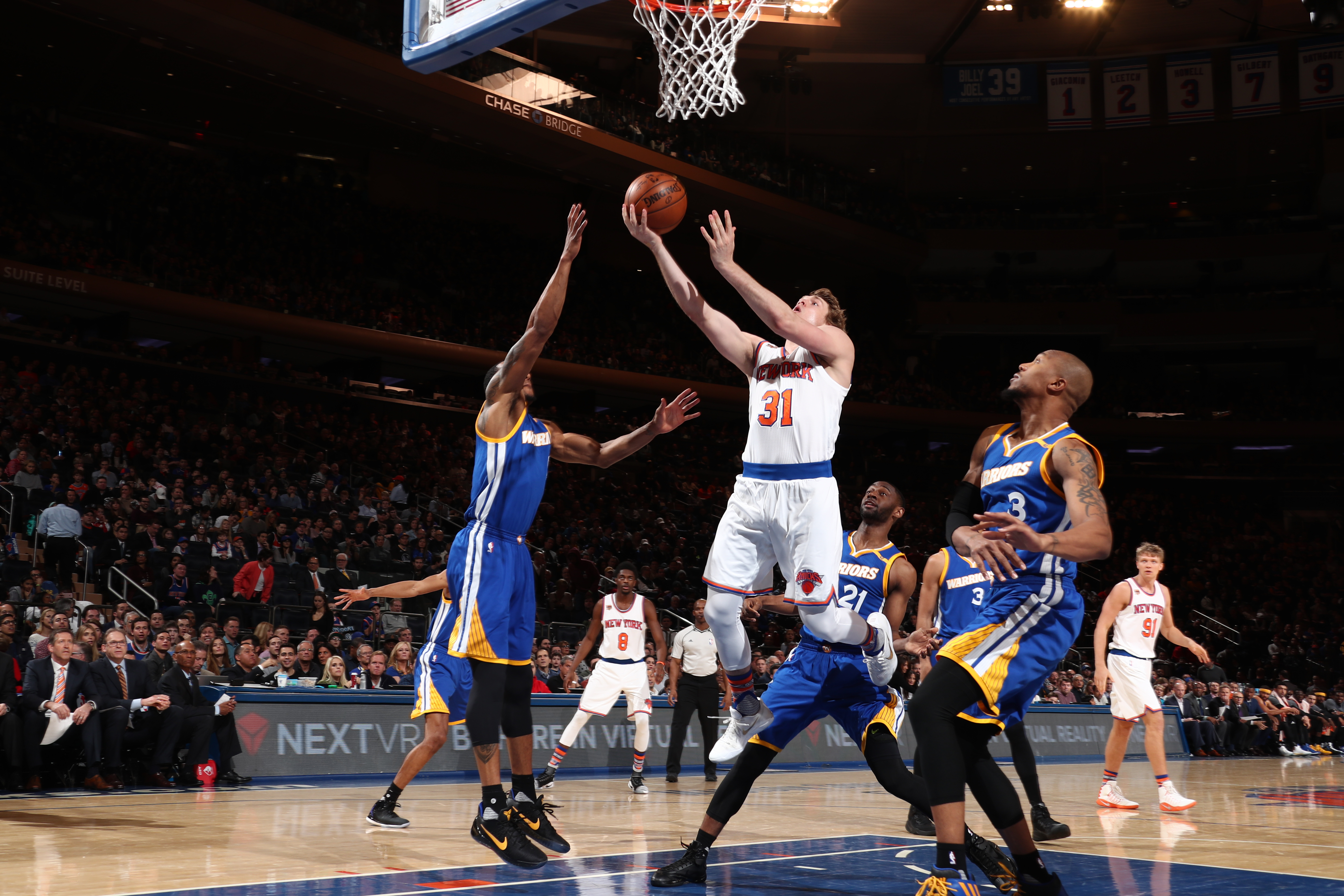 NEW YORK, NY - MARCH 5: Ron Baker #31 of the New York Knicks shoots the ball against the Golden State Warriors on March 5, 2017 at Madison Square Garden in New York City, New York. NOTE TO USER: User expressly acknowledges and agrees that, by downloading and or using this photograph, User is consenting to the terms and conditions of the Getty Images License Agreement. Mandatory Copyright Notice: Copyright 2017 NBAE (Photo by Nathaniel S. Butler/NBAE via Getty Images)