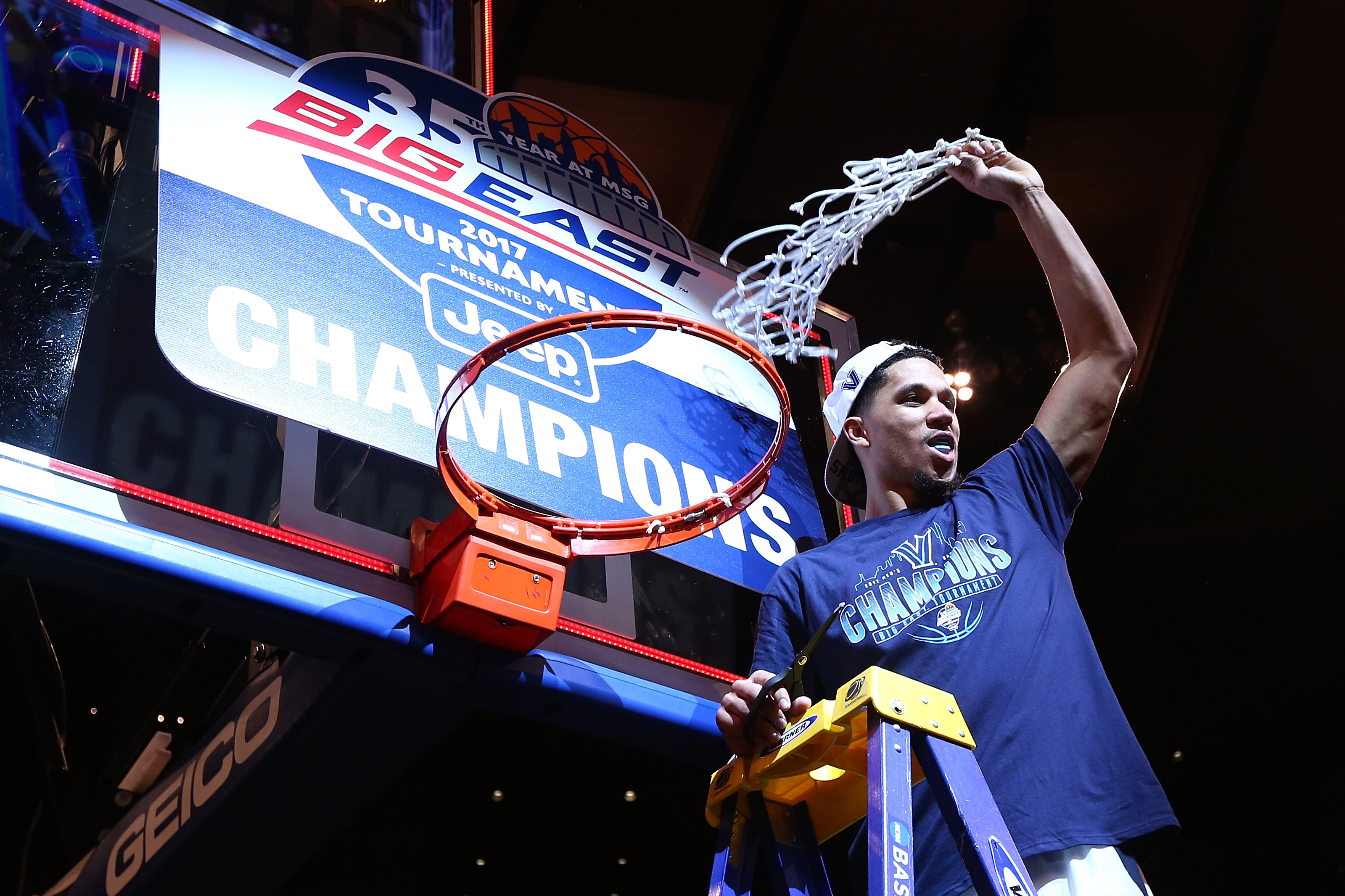 NEW YORK, NY - MARCH 11: Josh Hart #3 of the Villanova Wildcats cuts the net after defeating the Creighton Bluejays to win the Big East Basketball Tournament - Championship Game at Madison Square Garden on March 11, 2017 in New York City. (Photo by Mike Stobe/Getty Images)