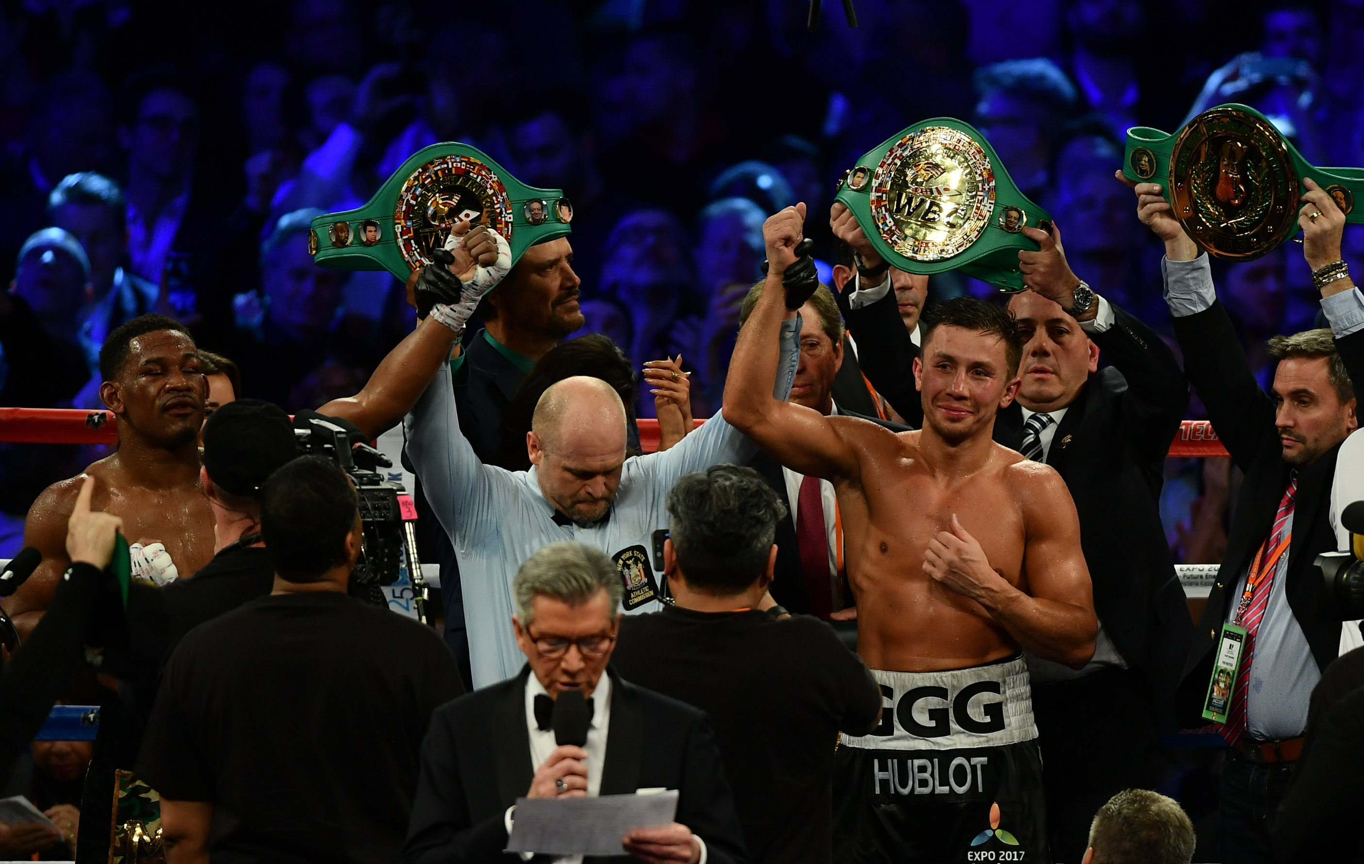 New York , United States - 18 March 2017; Gennady Golovkin, right, is announced victorious over Daniel Jacobs in their middleweight title bout at Madison Square Garden in New York, USA. (Photo By Ramsey Cardy/Sportsfile via Getty Images)
