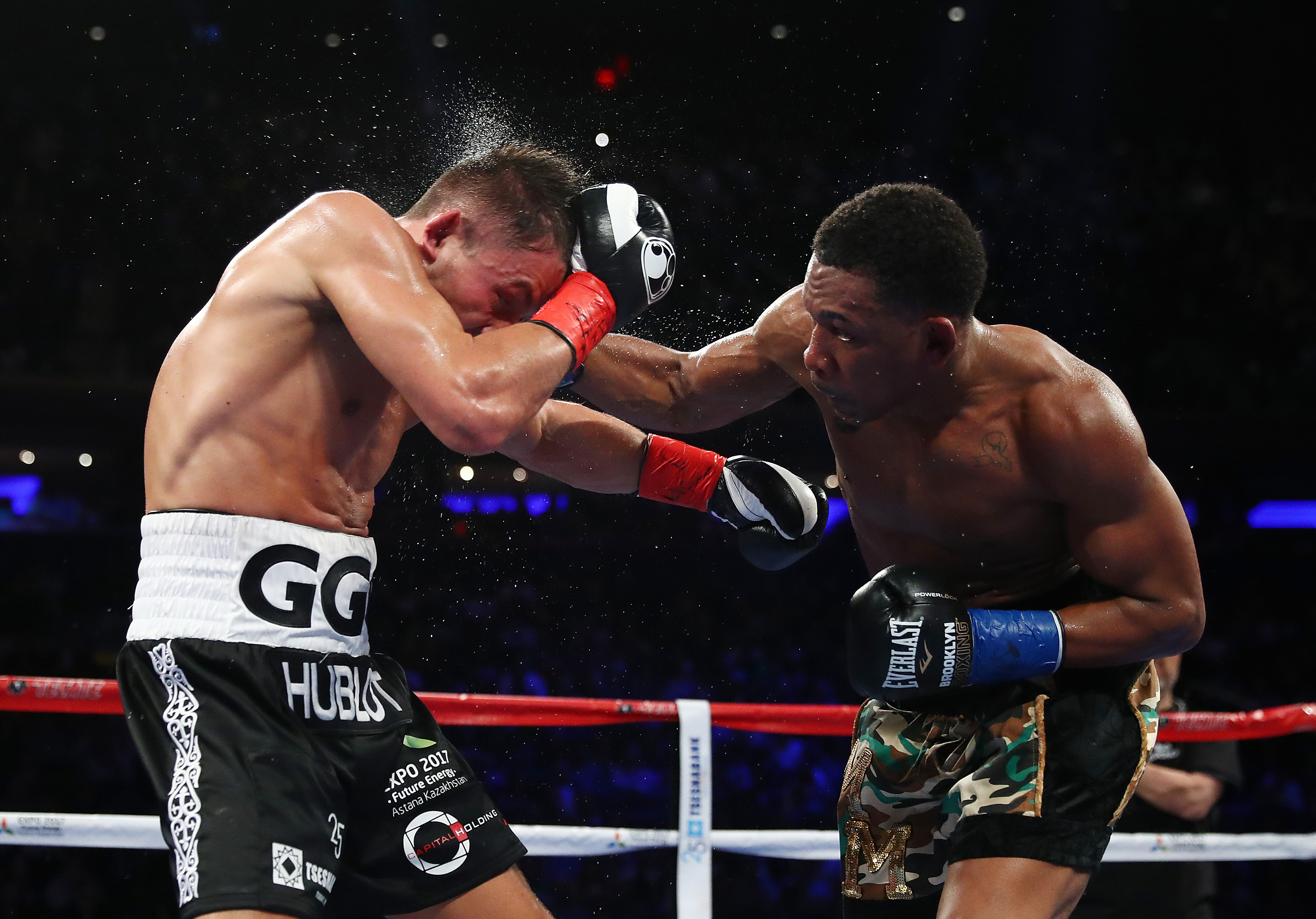 NEW YORK, NY - MARCH 18: Daniel Jacobs punches Gennady Golovkin during their Championship fight for Golovkin's WBA/WBC/IBF middleweight title at Madison Square Garden on March 18, 2017 in New York City. (Photo by Al Bello/Getty Images)
