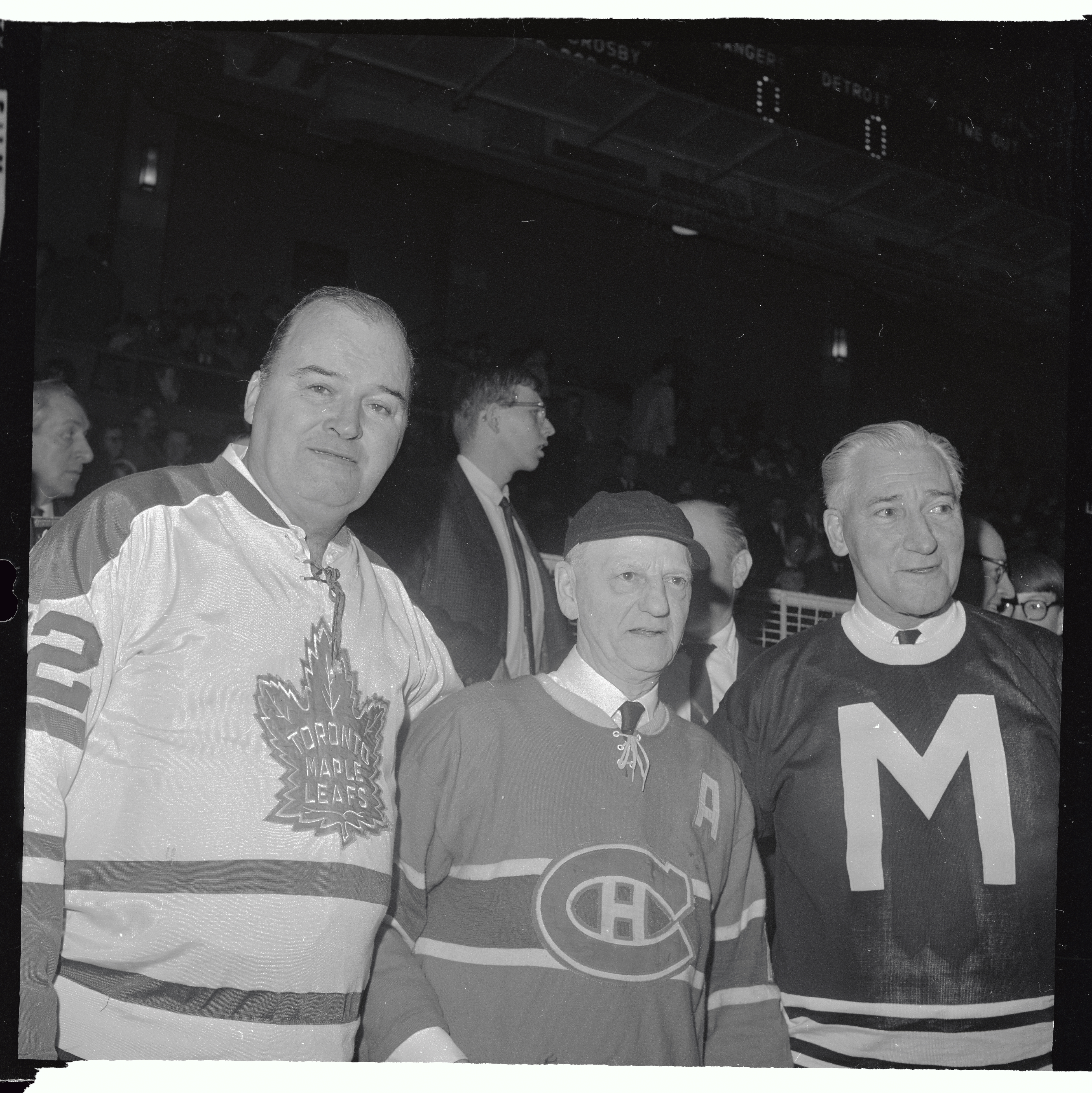 (Original Caption) At the Madison Square Garden celebration for old time hockey professionals are Gordon Drillon, (L) of Toronto, Aurel Joliat, (C) of Montreal, and Baldy Northcott of Montreal.