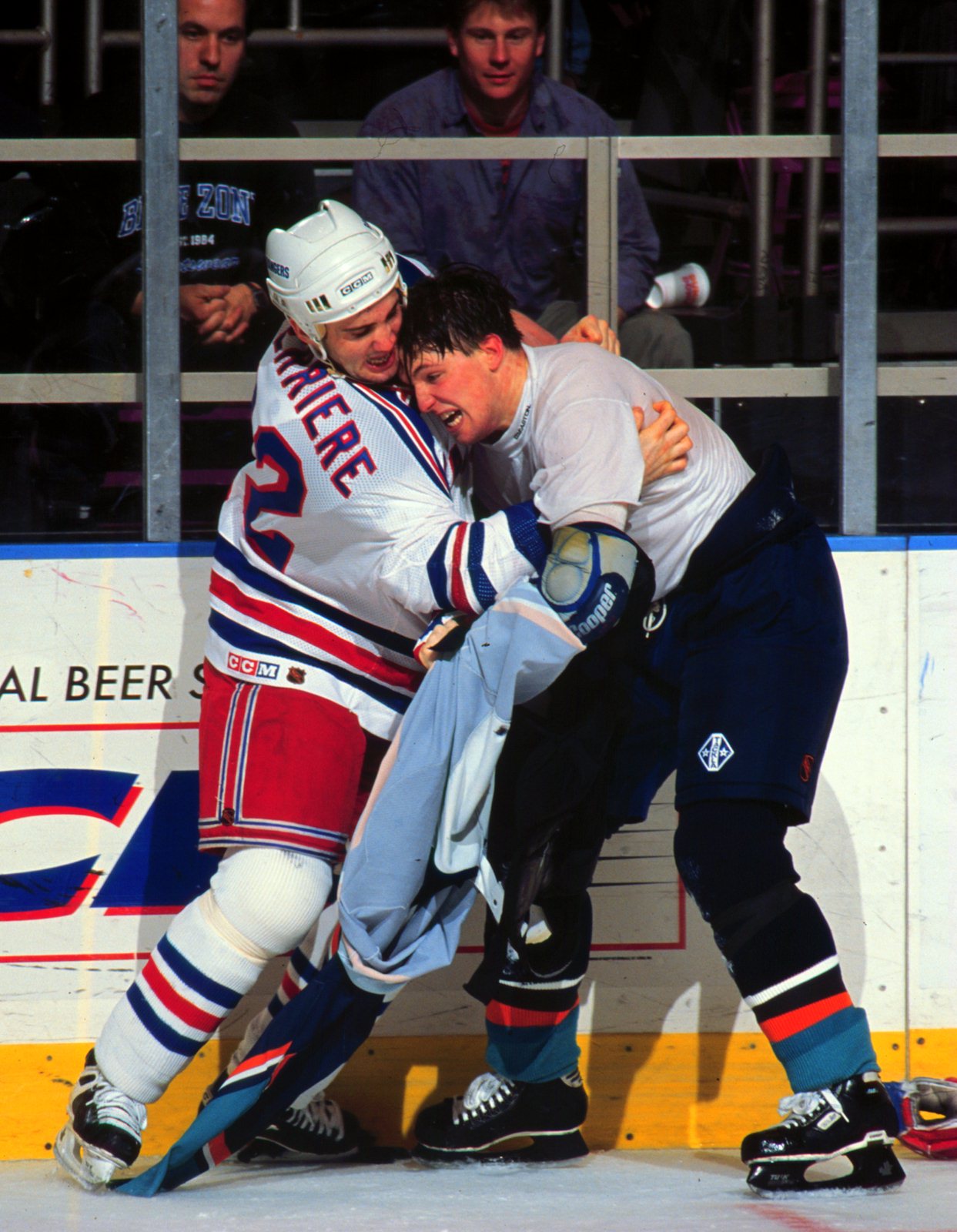 Ranger Ian Laperriere and Islander Bryan McCabe rough it up. (Photo by Bruce Bennett Studios/Getty Images)