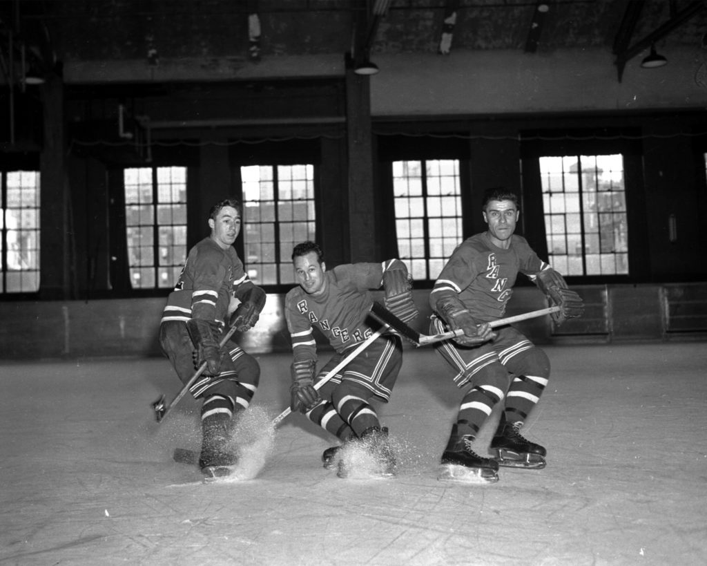 Duncan Fisher, Edgar Laprade and Tony Leswick, 10-17-49. (Photo by Bruce Bennett Studios/Getty Images)
