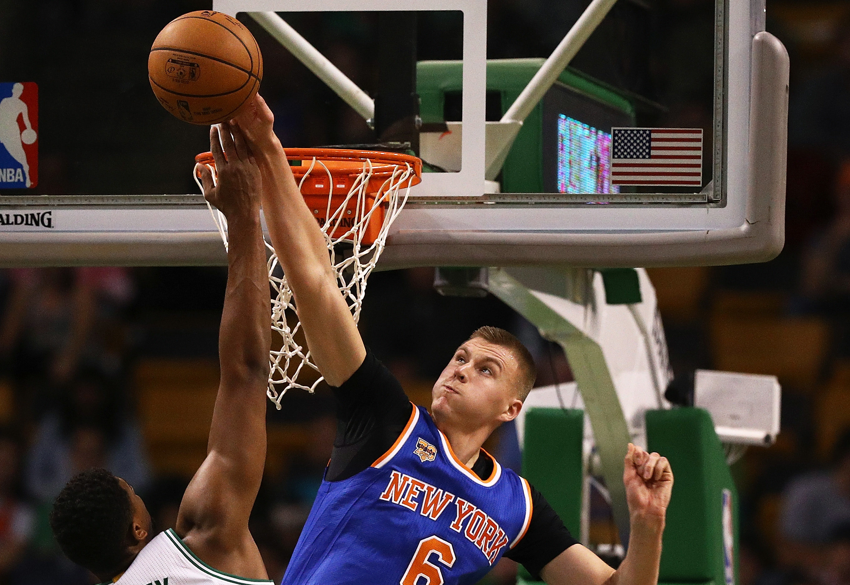 BOSTON, MA - OCTOBER 17: Kristaps Porzingis #6 of the New York Knicks blocks a shot by Jordan Mickey #55 of the Boston Celtics during the second quarter at TD Garden on October 17, 2016 in Boston, Massachusetts. (Photo by Maddie Meyer/Getty Images)
