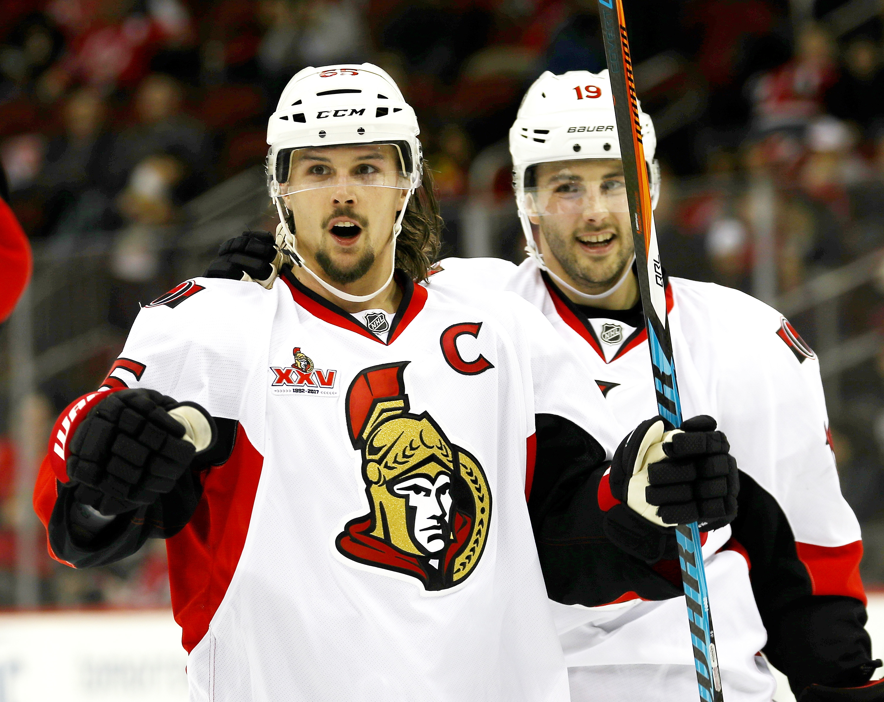 NEWARK, NJ - FEBRUARY 16: Erik Karlsson #65 of the Ottawa Senators celebrates his goal as teammate Derick Brassard #19 stands by in the third period against the New Jersey Devils on February 16, 2017 at Prudential Center in Newark, New Jersey.The Ottawa Senators defeated the New Jersey Devils 3-0. (Photo by Elsa/Getty Images)
