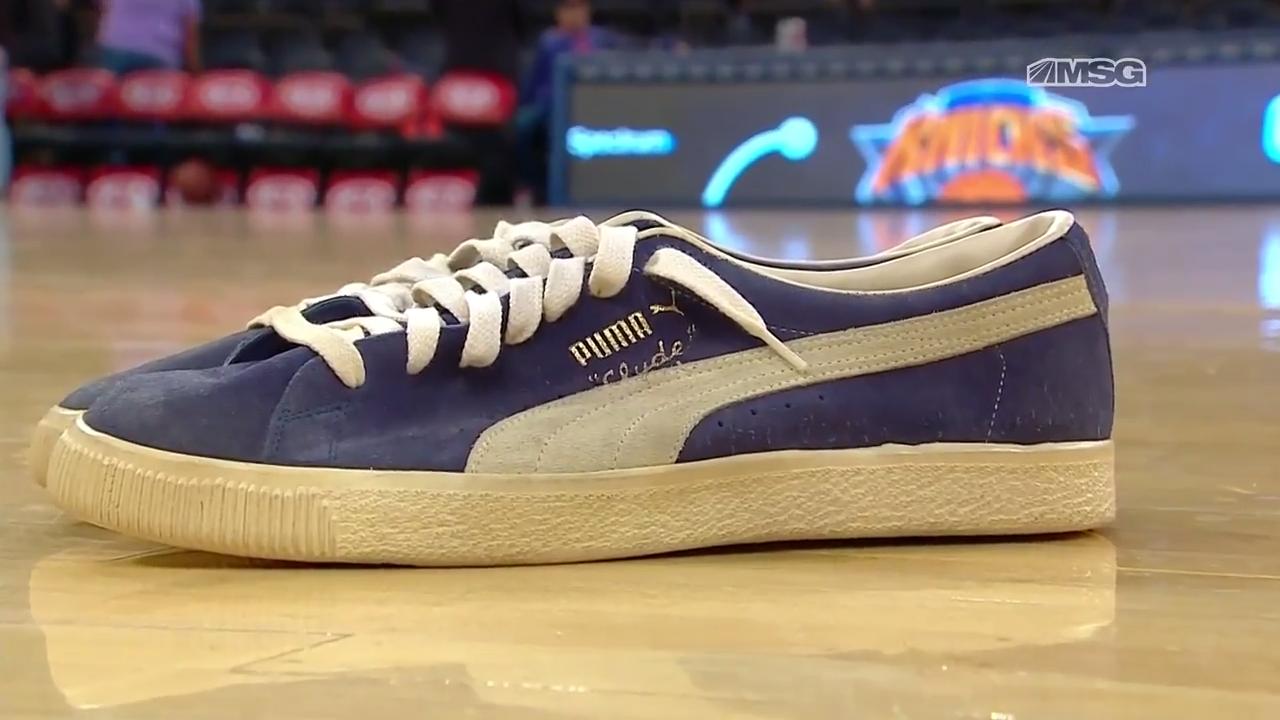 Clyde Gets His Hands on His Puma Shoes 